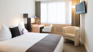 TV in/ali zabaviščno središče v nastanitvi Crowne Plaza Zürich by IHG