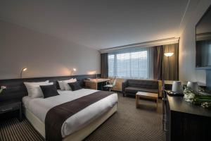 Postelja oz. postelje v sobi nastanitve Crowne Plaza Zürich by IHG