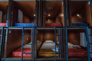 Postel nebo postele na pokoji v ubytování OYO Hostal Mich