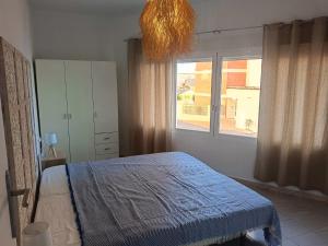 Ένα ή περισσότερα κρεβάτια σε δωμάτιο στο Apartment Palasiet