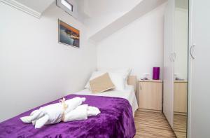 Ein Bett oder Betten in einem Zimmer der Unterkunft Apartment Superb View 2