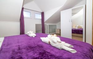 Ein Bett oder Betten in einem Zimmer der Unterkunft Apartment Superb View 2