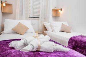 Ein Bett oder Betten in einem Zimmer der Unterkunft Apartment Superb View 2
