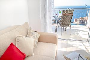 Ein Sitzbereich in der Unterkunft Apartment Superb View 2