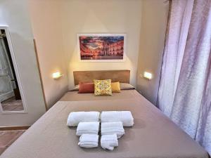 Postel nebo postele na pokoji v ubytování Case Triscele - B&B
