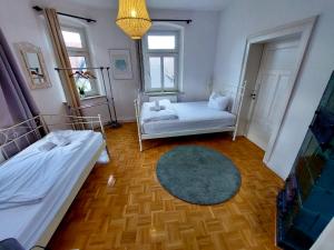 Postel nebo postele na pokoji v ubytování Old Town Center Apartments