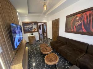 TV a/nebo společenská místnost v ubytování Presken Hotel @Villa
