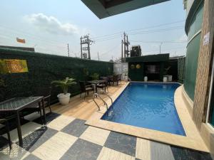 The swimming pool at or close to Presken Hotel at International Airport Road