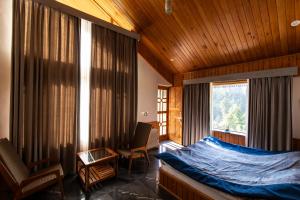 Ένα ή περισσότερα κρεβάτια σε δωμάτιο στο Eden Stay & Cafe