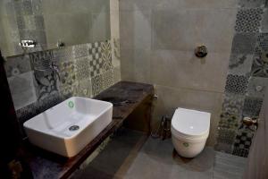 Koupelna v ubytování Hotel Hrushikesh
