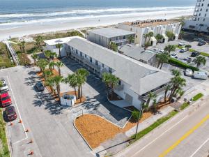 an aerial view of a building at the beach at A Wave From It All Oceanview 2Nd Level Patio in Jacksonville Beach