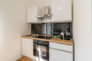 Η κουζίνα ή μικρή κουζίνα στο Appartamento Centrale - a pochi passi dalla Stazione