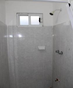 Koupelna v ubytování OYO Hotel Colibri