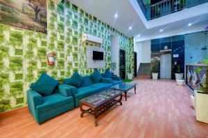 Posezení v ubytování Hotel Palm Emerald At Airport