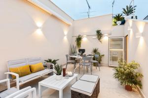 Posedenie v ubytovaní Boutique Terrazza Aurea