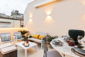 Posedenie v ubytovaní Boutique Terrazza Aurea