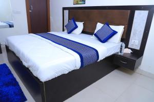 Postel nebo postele na pokoji v ubytování Hotel Elite inn + 3 fotografie