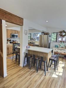 a kitchen with a table and some chairs in it at Walking Distance To The Lake And Beach! in Kings Beach