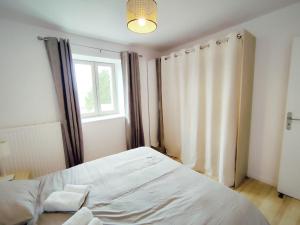 Postel nebo postele na pokoji v ubytování Gîte de groupe "chez le Dragou"