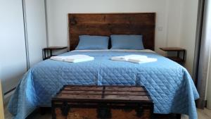 Cama ou camas em um quarto em Quinta do Oratório Agroturismo
