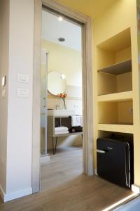 Postel nebo postele na pokoji v ubytování Reyes Suite & Rooms