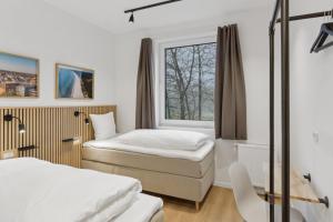 Postel nebo postele na pokoji v ubytování Easy Stay + 23 fotografií