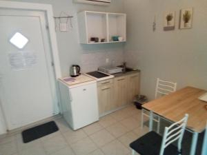 Kuchyň nebo kuchyňský kout v ubytování Apartment Lea