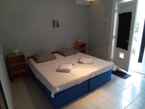 Postel nebo postele na pokoji v ubytování Apartment Lea