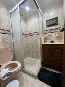Phòng tắm tại Acogedora casa cerca del Metro bañera - Gym - Parking