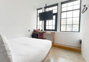 Televiisor ja/või meelelahutuskeskus majutusasutuses ART'OTEL Ximending TAIPEI