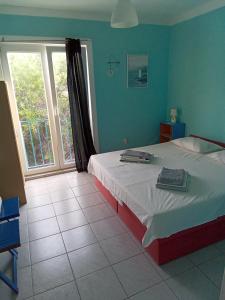 Postel nebo postele na pokoji v ubytování Apartment Lea