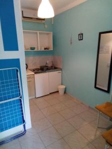 Kuchyň nebo kuchyňský kout v ubytování Apartment Lea