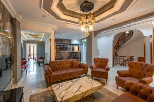 Kuchyň nebo kuchyňský kout v ubytování Olimpic Hotel