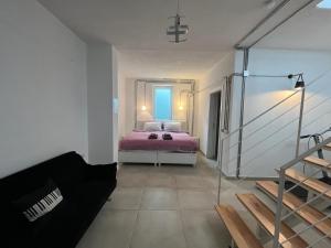 Postel nebo postele na pokoji v ubytování Derya Beach Agullu Villa + 20 fotografií
