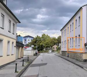 an empty street in a city with buildings at Stylish & central #LoftWerk 2 in Velbert
