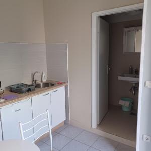 Kuchyň nebo kuchyňský kout v ubytování Apartment Lea
