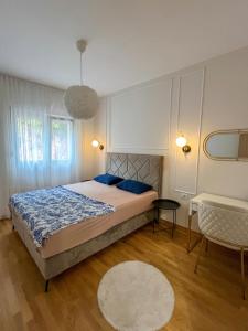 Postel nebo postele na pokoji v ubytování Luxury apartment with garage in Old bakery