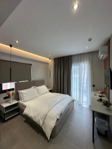 Ένα ή περισσότερα κρεβάτια σε δωμάτιο στο Villa Idrizi +37 φωτογραφίες
