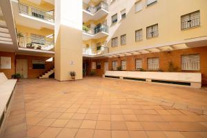 an empty courtyard of an apartment building at Apartamento Bajamar in Sanlúcar de Barrameda