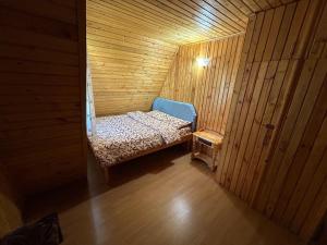 Postel nebo postele na pokoji v ubytování Vila Bradul Tarcău