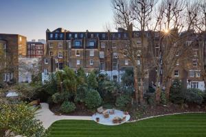 an aerial view of a building with a garden at Miiro Templeton Garden in London