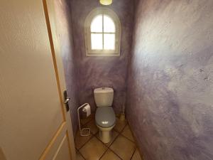 a small bathroom with a toilet and a window at Villa spacieuse 3 chambres avec jardin, terrasse et garage à Argelès Village - FR-1-388-185 in Argelès-sur-Mer +9 photos
