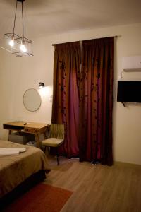 Postel nebo postele na pokoji v ubytování Nafsika Hotel Athens Centre