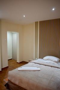 Postel nebo postele na pokoji v ubytování Nafsika Hotel Athens Centre