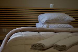 Postel nebo postele na pokoji v ubytování Nafsika Hotel Athens Centre