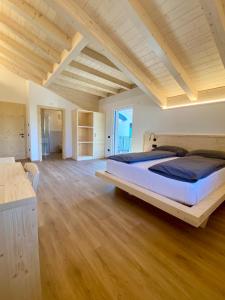 Postel nebo postele na pokoji v ubytování Agritur Casamela
