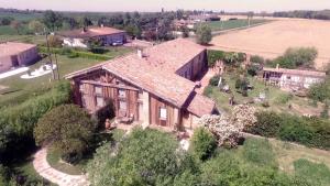 an aerial view of a house with a yard at Baugnac in Lavalette