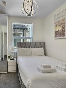 Postel nebo postele na pokoji v ubytování Granada Apartments Derby Road