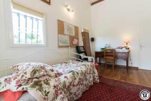 En eller flere senge i et værelse på Balanquier