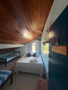 Postel nebo postele na pokoji v ubytování Casa dos Franceses Ilha Grande